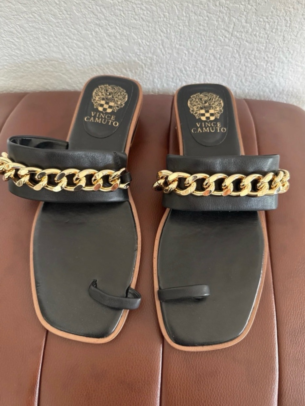 Women's slip-on shoes with chain detail